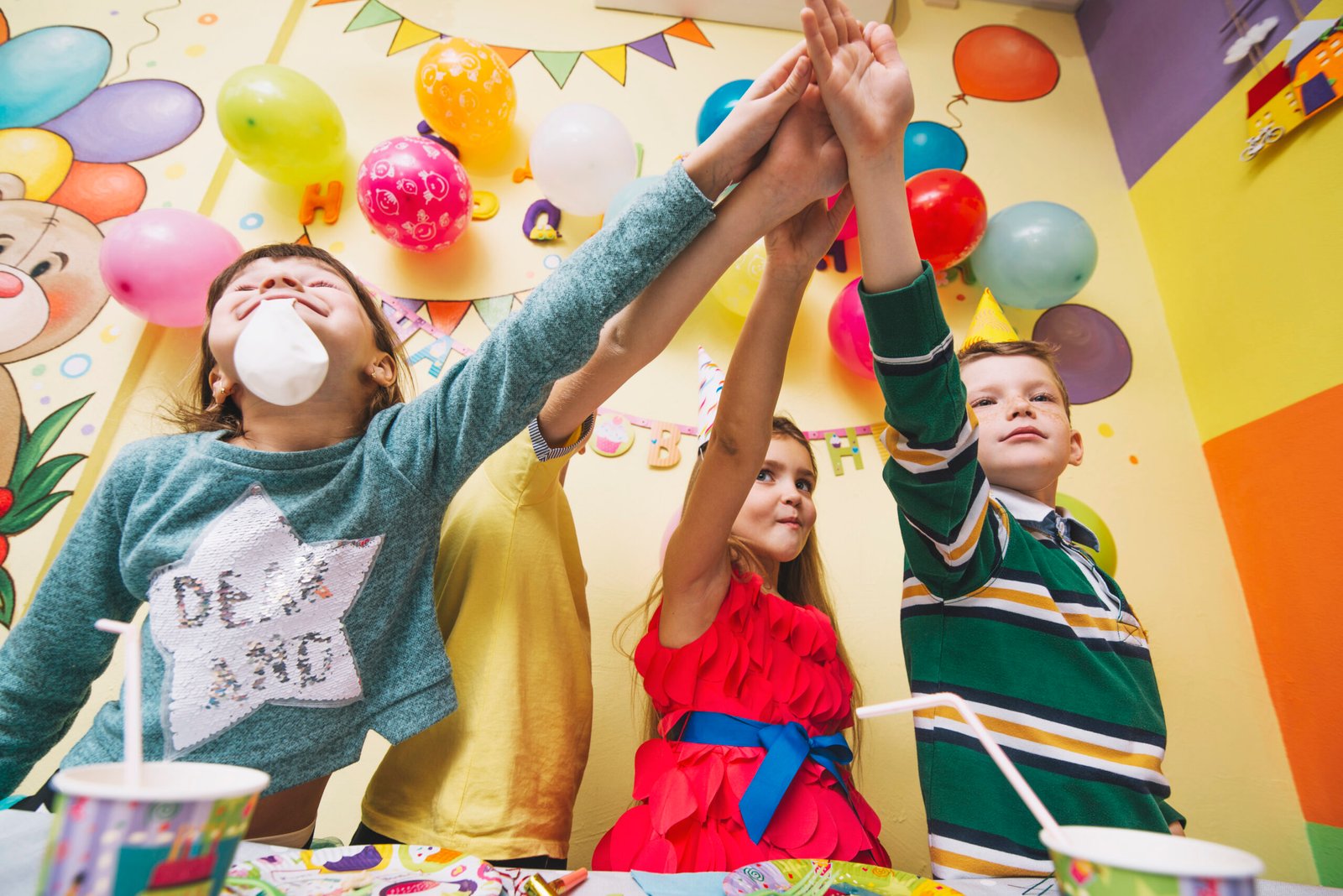 kids-holding-hands-together-birthday-party